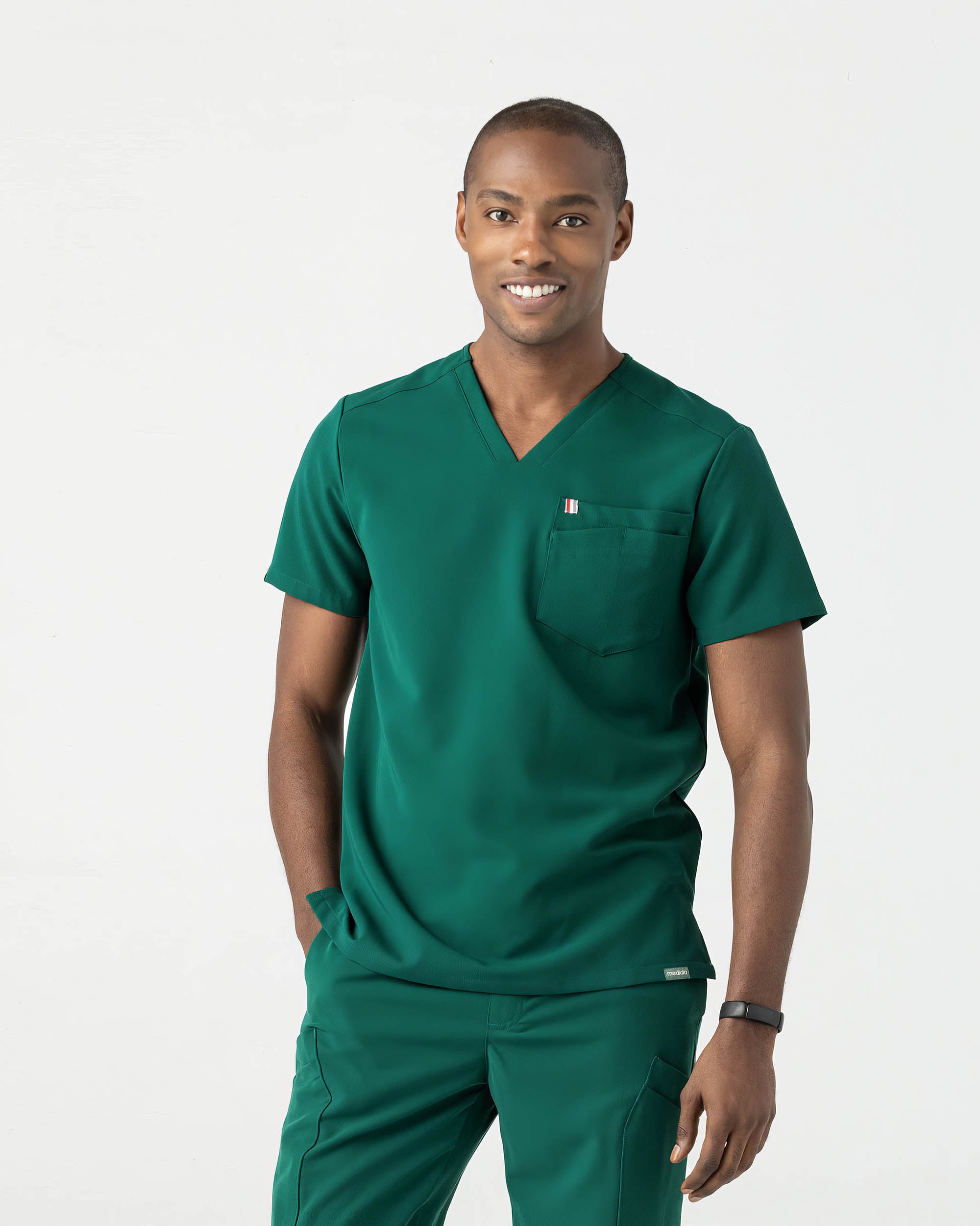 Mediclo Men's Crevan 3-Pocket Scrub Top - Hunter Green/S - Recycled Polyester - Rayon - Spandex - Sustainable Materials Mediclo Men's Crevan 3-Pocket Scrub Top - Hunter Green/S - Recycled Polyester - Rayon - Spandex - Sustainable Materials