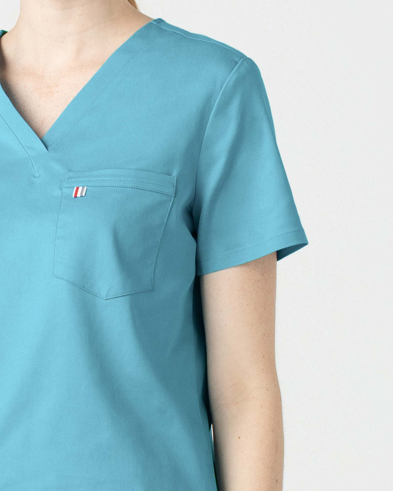 Island Blue Sal Essential Scrub Top Tencel - Close Up Front Pocket View